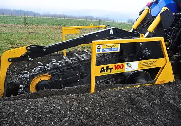 AFT100 — Heavy-duty tractor-mounted chain trencher for demanding conditions
